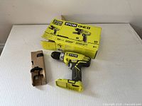 Hammer drill, side handle and box overview