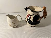 Front view of both pitchers side by side