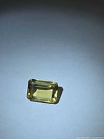 Front view of the emerald-cut vivid golden heliodor