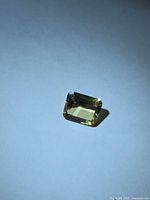 Emerald-cut golden yellow helidor gemstone front view