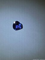 Top view of pear-cut Tanzanite showing deep blue colour and facets