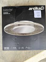 Front of box showing Artika Essence Disk LED ceiling light image and specifications