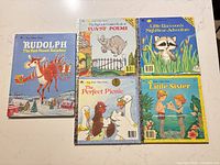All five Big Little Golden Books grouped