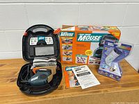 Overall lot: Mouse sander kit in case, outer box, sealed power scrubber