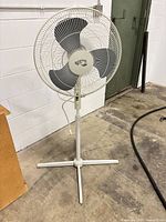 Full view of Hampton Bay pedestal fan showing overall design and base