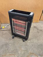 Full front view showing quartz tubes, grill, casters