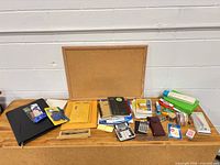 Overall view of cork board and grouped office items