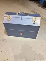 front view of blue Beach cantilever toolbox closed