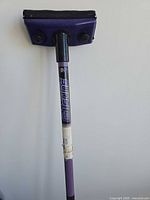 Close-up of broom head and upper shaft