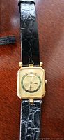 Front view of Raymond Weil gold electroplated wristwatch