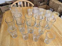 All 22 glasses grouped on table showing three distinct styles