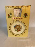 Bunnykins display box showing contents through window