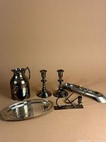 Group shot of all six silver-plated items