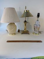 All three lamps front view with ruler for scale