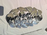 Top view of silver-tone metal leaf centerpiece bowl