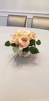 Front view of silk rose arrangement in glass bowl