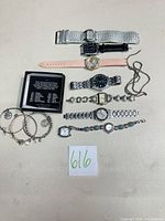 Group shot of all watches, bracelets and chain