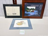 Group shot of all three artworks displaying frames and mats