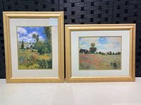 Both framed Monet prints showing artwork, mats and gold frames