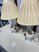 Both lamps with shades displayed on tabletop