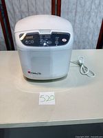 Front and side view of Regal Kitchen Pro bread maker showing control panel and overall condition