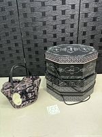 Handbag and stacked hat boxes side by side