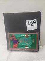 Front view of black binder with Select pack artwork insert