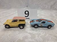 Front and side view of both slot cars