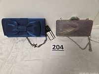 Front view of both handbags with chains displayed