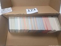 Box with large stack of approximately 640 baseball cards