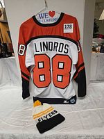 Back view of Lindros #88 jersey with knit hat