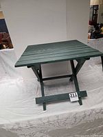 Square green slat folding table front view