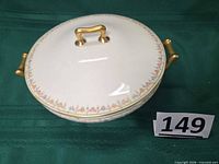Full view of covered dish with lid and side handles