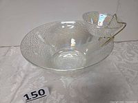 Large and small iridescent glass bowls assembled with bracket