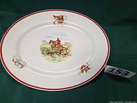 Full view of oval platter front showing design and rim