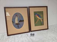 Both framed yarn art pictures side by side