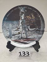 Front view of commemorative plate on stand