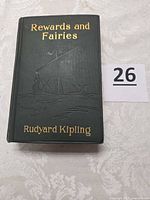 Front cover showing title, author and embossed artwork