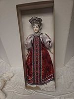 Doll in original box showing full front view