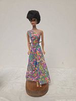 Front view of Barbie doll wearing Patio Party jumpsuit