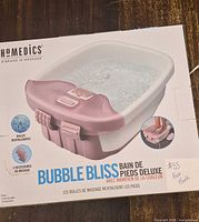Front of product box showing HoMedics Bubble Bliss foot spa image and features