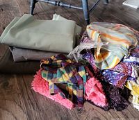 Overall view of all fabric pieces in lot