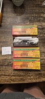 All three Roundhouse HO scale boxcar kits, one box opened to show parts