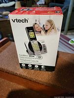 Front of VTech retail box showing handset and base