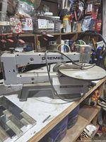 Full view of Dremel 16" scroll saw on workbench