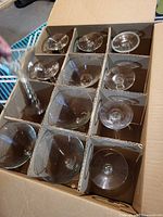 Box with 12 martini glasses in cardboard dividers