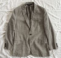 Front view of blazer laid flat showing overall style and pattern
