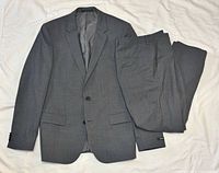 Full suit laid out – jacket and trousers