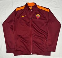 Full front view of jacket laid flat showing overall design