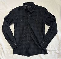 Front view of black tonal check long sleeve Ralph Lauren shirt with pearl snaps
